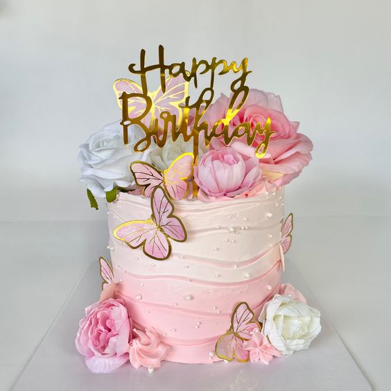 Birthday cake with flowers and butterflies and flowers