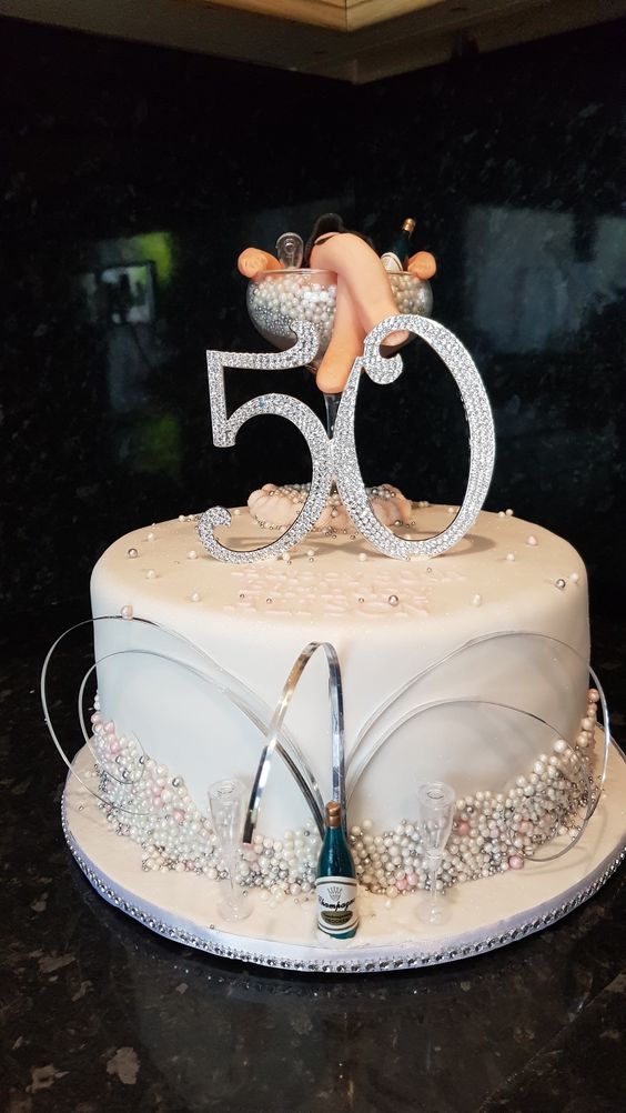 Feminine cake decorations for a 50th birthday