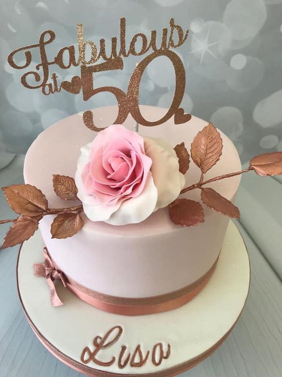 elegant 50th birthday cake with hand made rose