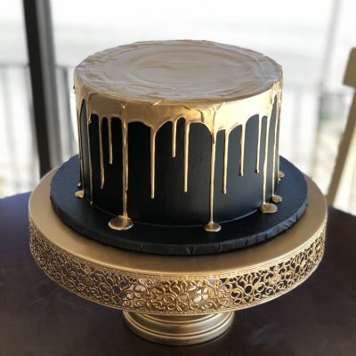 birthday black and gold drip cake