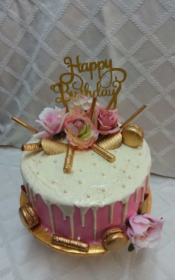 light pink and gold birthday cake