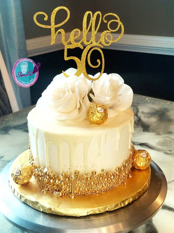 simple white and gold birthday cake